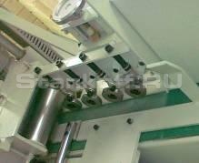 Механизм предварительного наживления ламелей