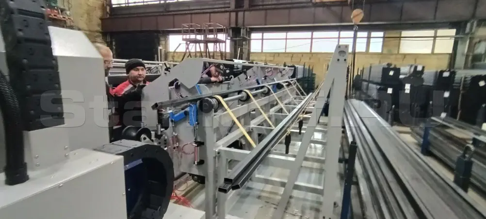 Система автоматической погрузки с ручной регулировкой диаметра труб