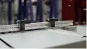 Три механических упора на рольгангах для возможности торцевать разный размер