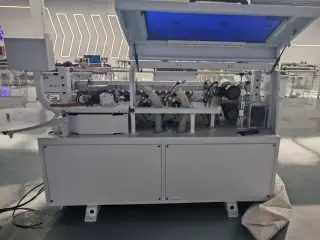 Высокоскоростной кромкооблицовочный станок WJ-1800GF — фото 4